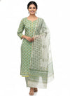 a green cotton printed kurta set with dupatta.