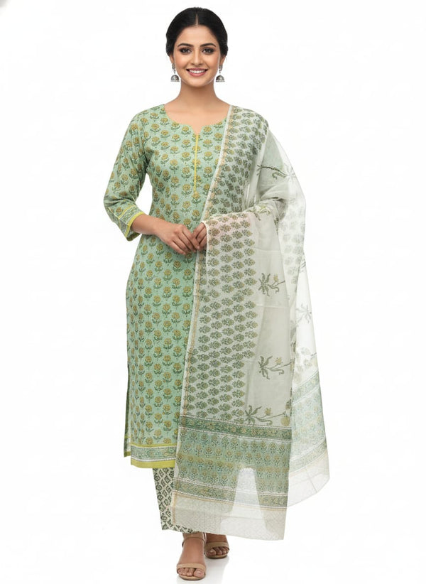 a green cotton printed kurta set with dupatta.