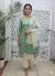 a green and white cotton kurti pant dupatta set