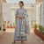 a white cotton floral block print kurta with pant and dupatta set